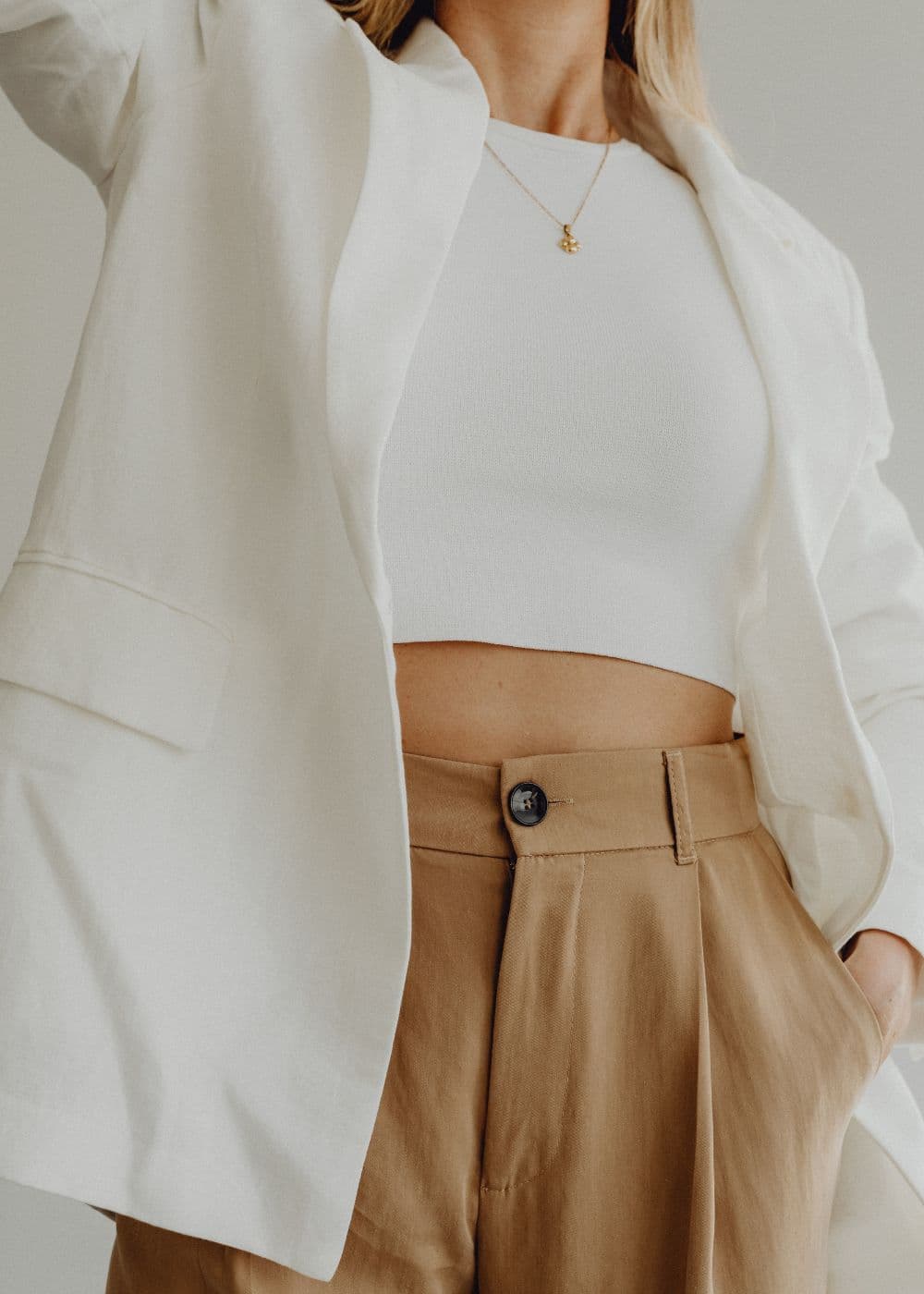 female entrepreneurs in white top and neutral color pant